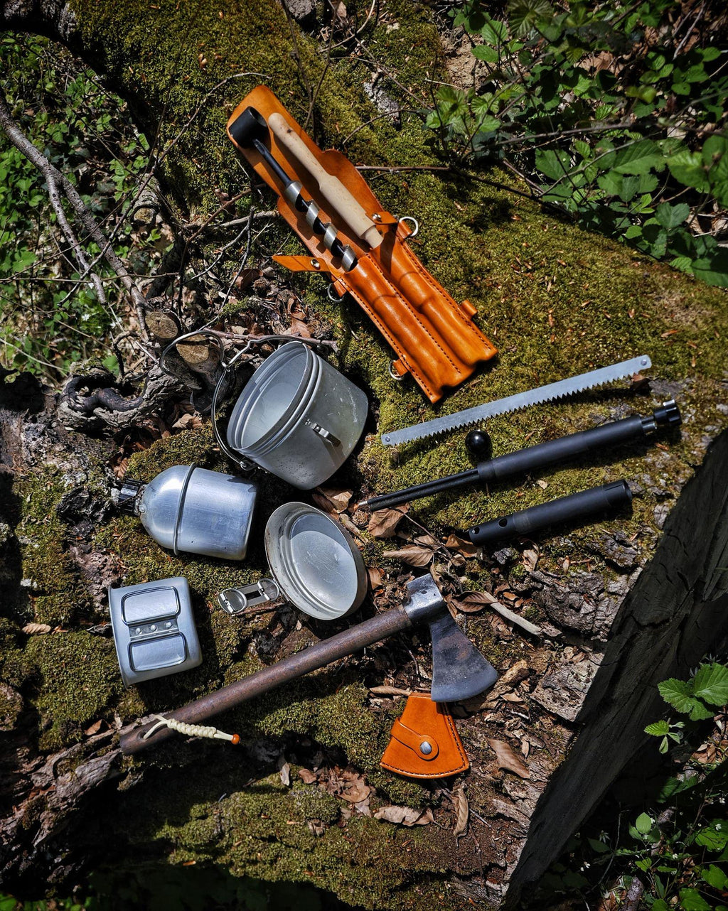 Handmade Leather Bushcraft Backpack – Includes Forged Axe, Swedish Stove with Pan, Canteen, Auger &amp; Folding Bow Saw