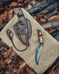 Custom handmade hand forged blacksmith primitive knife with leather sheath