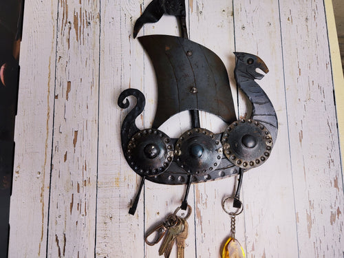 Blacksmith hand forged viking ship key holder. Key rack with 3 hacks