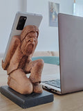 The Burden on Technology's Shoulders: Wooden Elder and Smartphone Stand