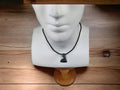 Handcrafted Steel Necklaces with Hammered Ax Figures: Forging Hot Iron Using Traditional Techniques