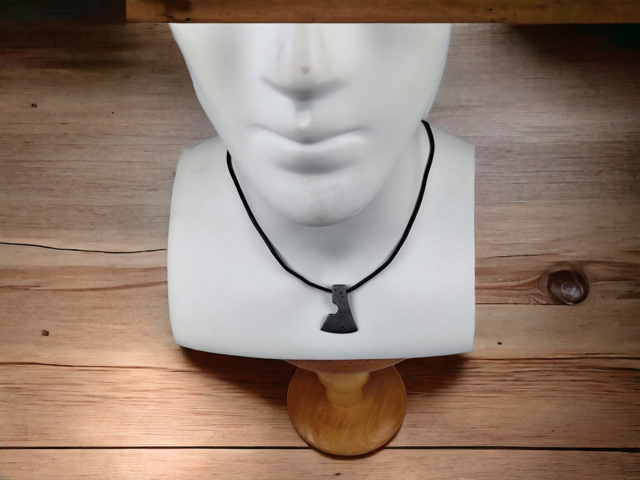 Handcrafted Steel Necklaces with Hammered Ax Figures: Forging Hot Iron Using Traditional Techniques