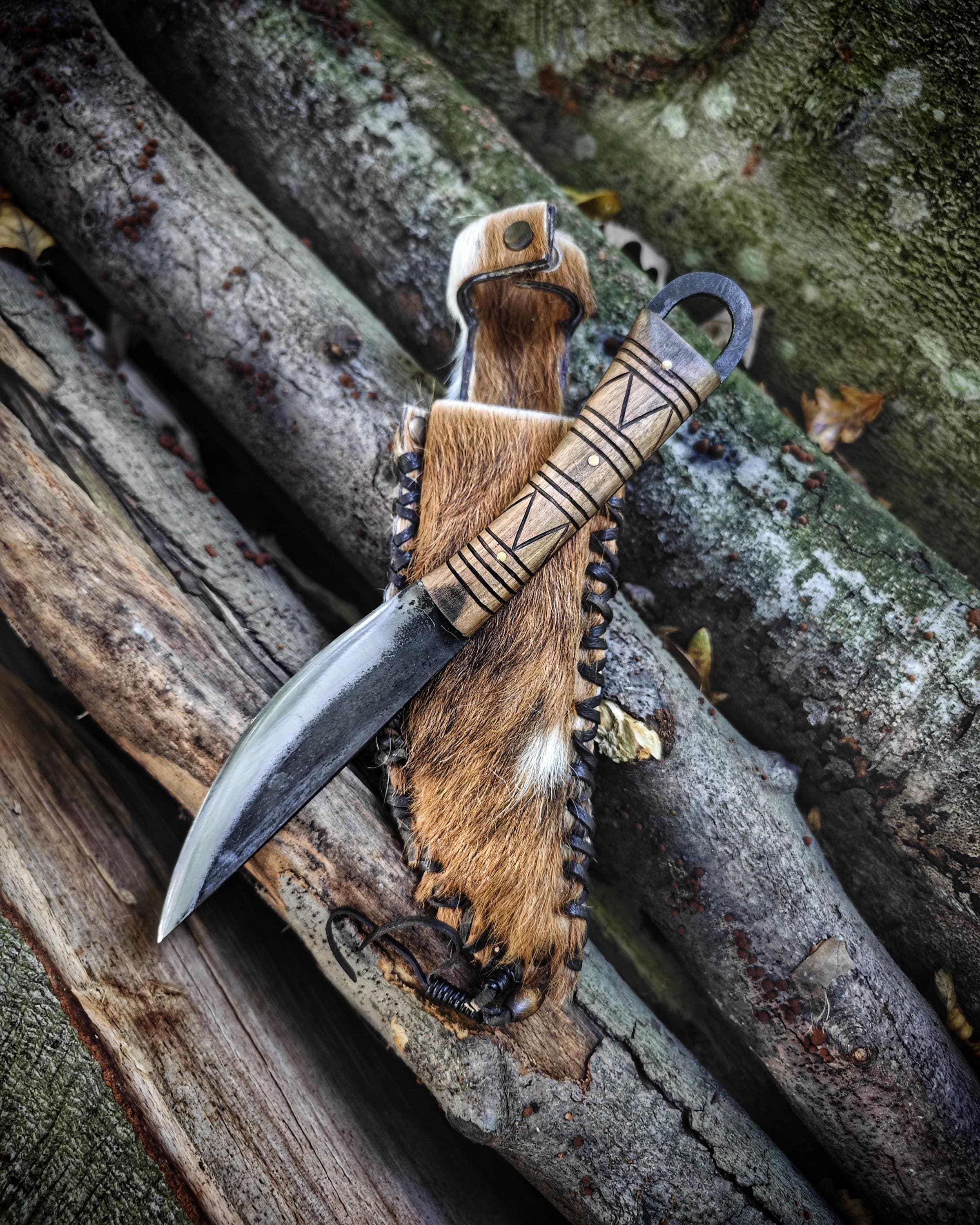 Viking style primitive blacksmith carbon steel handmade custom knife with natural genuie leather sheath.